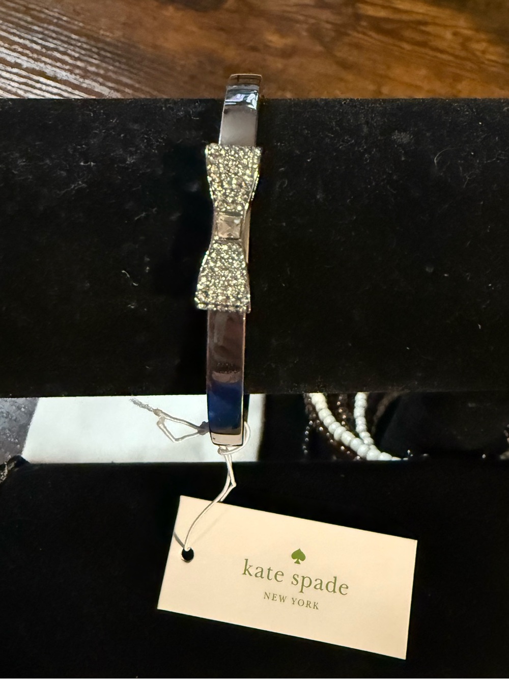 kate spade silver-tone crystal bow bangle bracelet